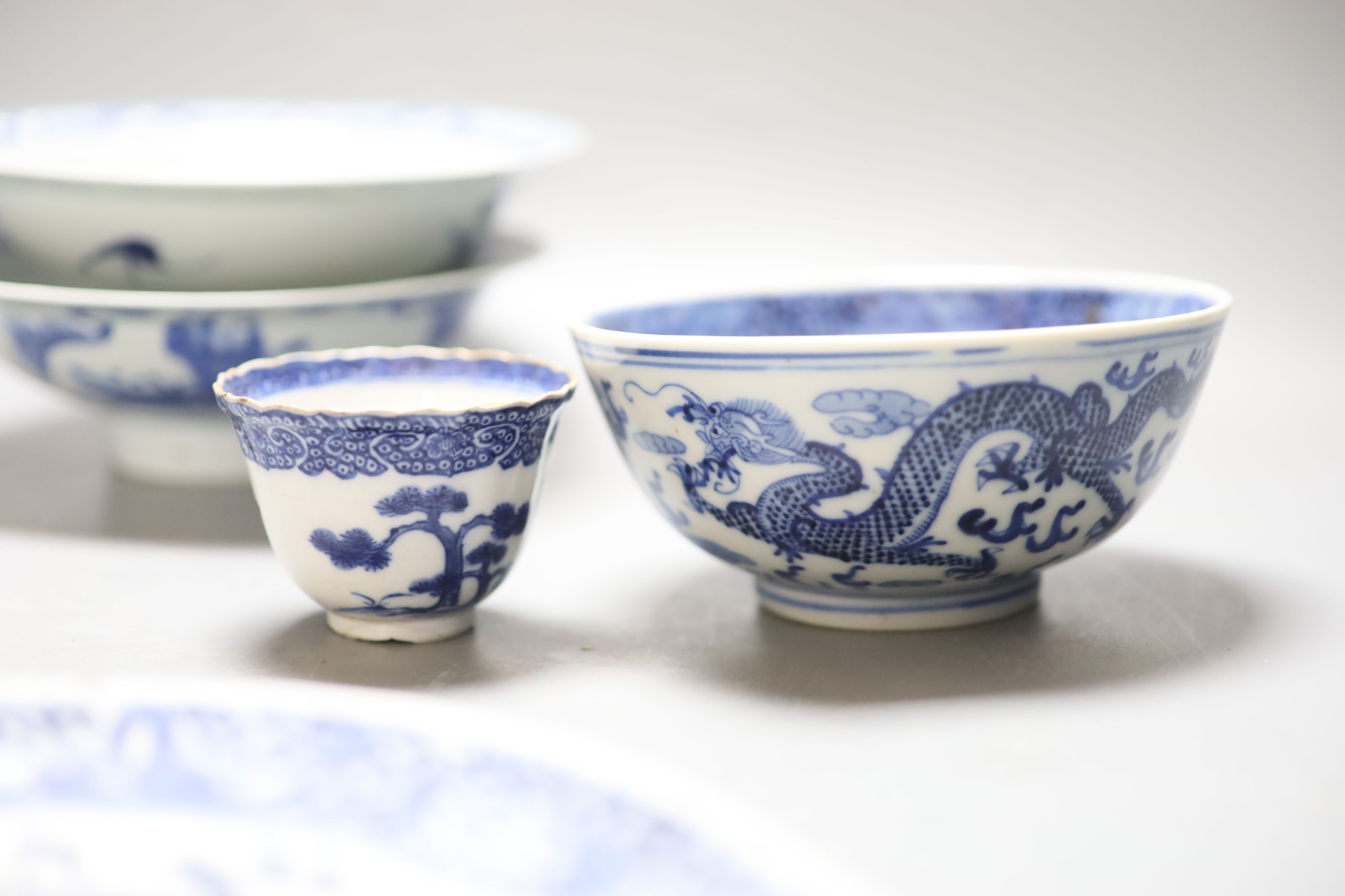 A quantity of mixed Chinese blue and white, together with a hardstone carving of Buddha